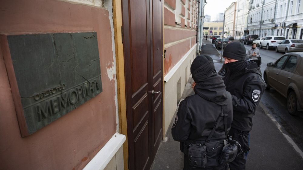 Police in Russia detain human rights activists after raids on offices and homes